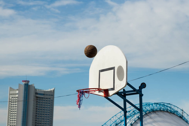 street basketball court ring board against the sky - Foto, Imagen