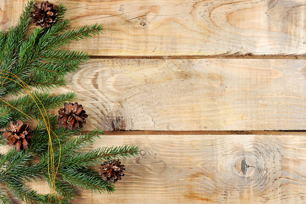 Christmas background with spruce branches and cones - Photo, Image