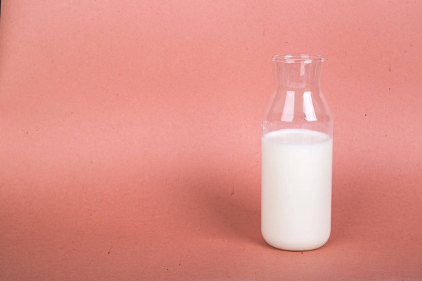 Single Milk in Bottle on Light Background - Foto, Imagem