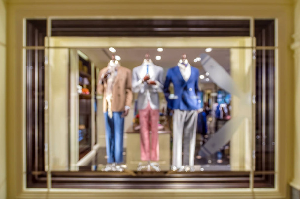 Abstract blurred photo of clothing store in a shopping mall, shopping concept - Photo, Image