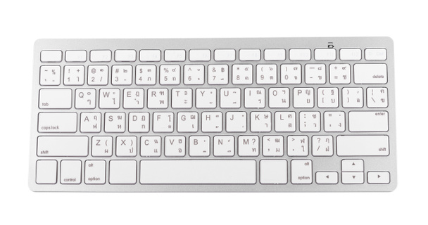 Vista superior del teclado inalámbrico blanco con teclas
 - Foto, Imagen