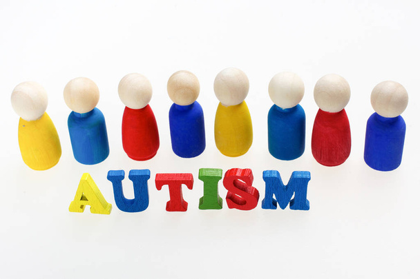 Autism inscription with figures and on white background - Foto, Imagem
