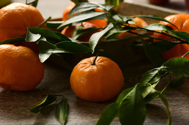 pile of sicilian mandarins on wooden table - Fotografie, Obrázek