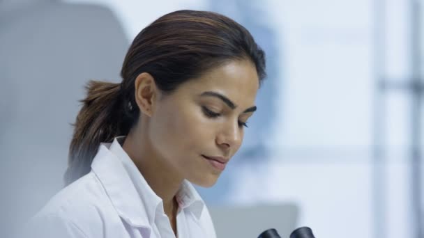 4K Close up portrait of smiling medical researcher working in the lab - Záběry, video