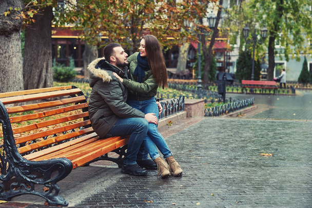 Young romantic couple in the city . A couple in love - Фото, изображение