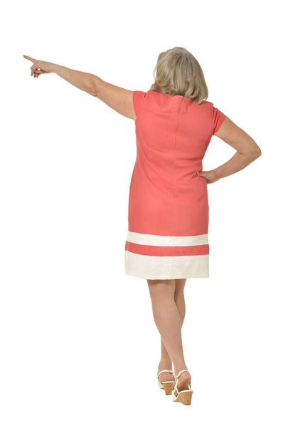  senior woman pointing isolated on white background - Photo, Image