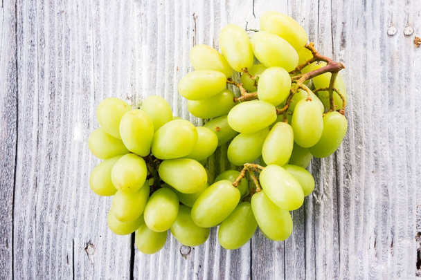 Grape on wooden background - Photo, image