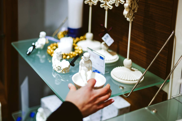 Woman shopping inside Villeroy & Boch ceramic porcelain - Photo, Image