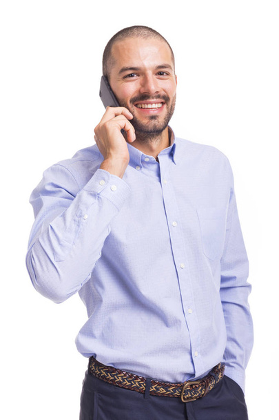 Handsome businessman talking on the phone  - 写真・画像