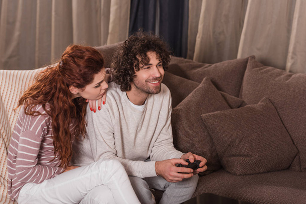 girlfriend waiting while boyfriend playing video game - Photo, Image