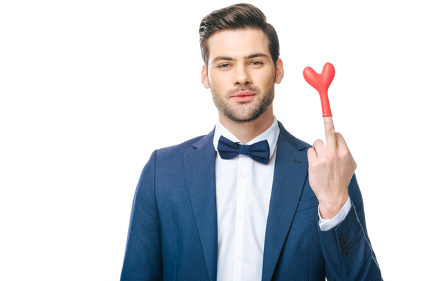 portrait of man in suit with heart shaped balloon on middle finger isolated on white - Φωτογραφία, εικόνα