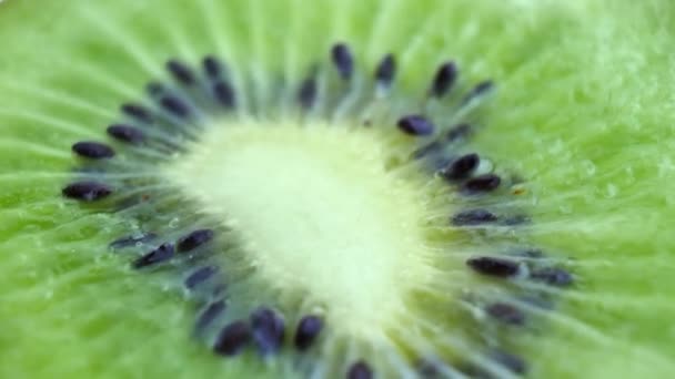 Juicy kiwi rotates as background - Footage, Video