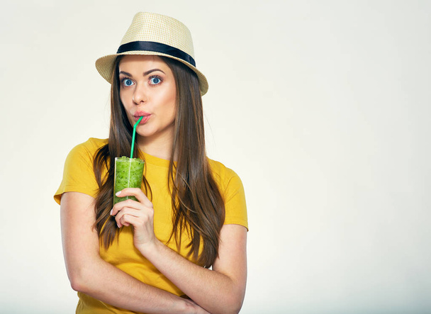portrait of young woman drinking juice - Zdjęcie, obraz