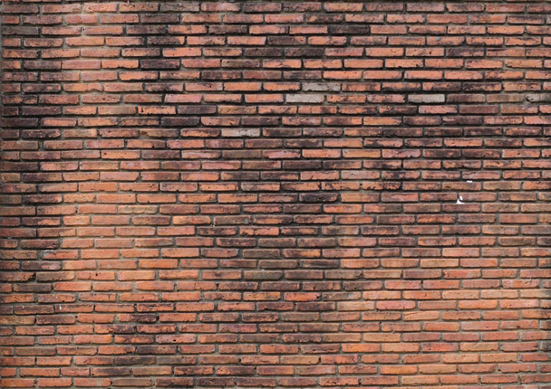 dimly lit old brick wall - Photo, Image