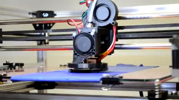 Automatic 3D printer performs black color plastic modeling objects. - Footage, Video