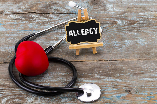 A board with the word allergy and stethoscope. The concept of me - Photo, Image