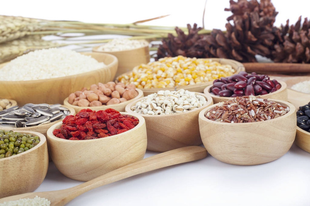 Cereal grains , seeds, beans on wooden background - Valokuva, kuva