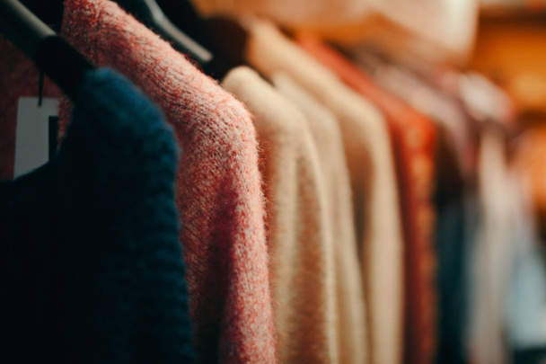 Clothing Items on a Rack in Fashion Store - Фото, зображення