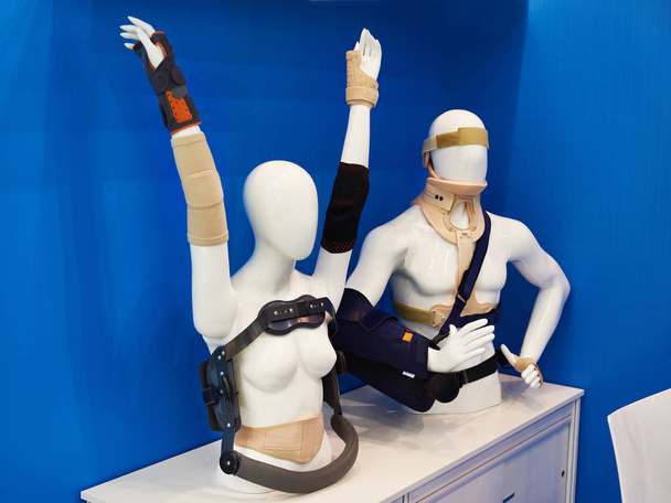 Postoperative bandages on mannequins in store - 写真・画像