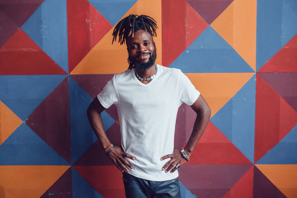 African American man with dreadlocks and a white T-shirt. Mock-up. - Фото, изображение