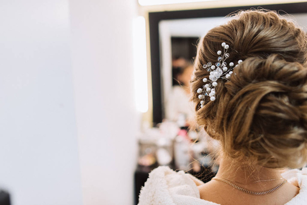 Rear view of elegant hairstyle of young bride  - Фото, изображение