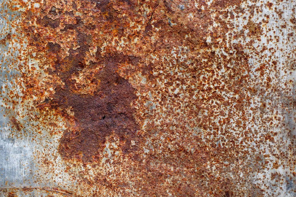 Винтажная ржавая железная стена со многими пятнами краски
 - Фото, изображение