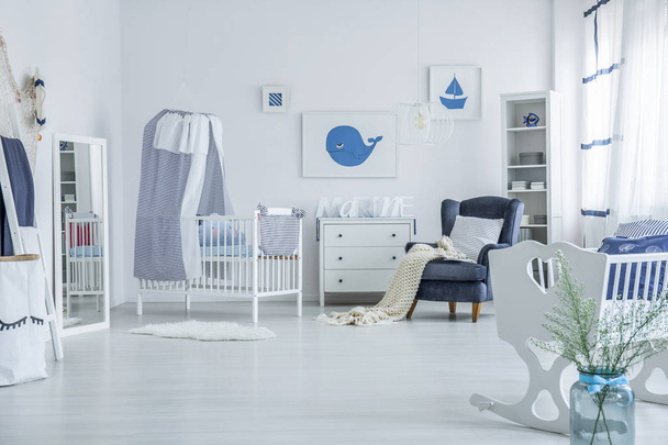 Spacious baby's room with crib - Zdjęcie, obraz