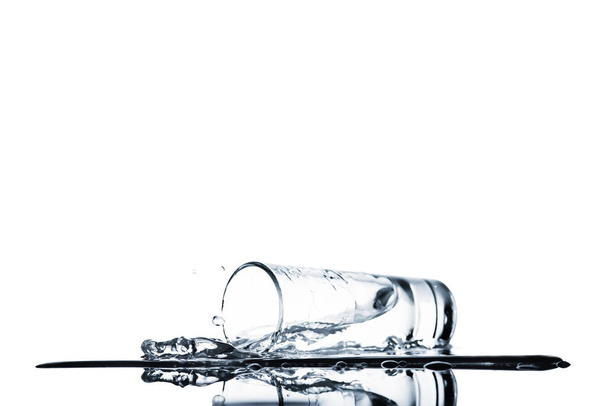 fresh water spilling from glass isolated on white - Photo, Image