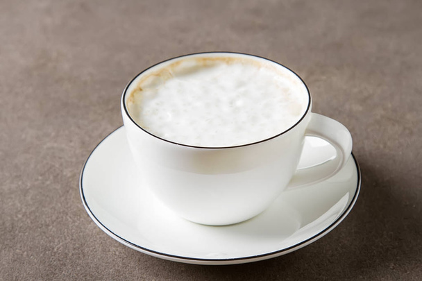 Italian homemade espresso coffee in a white mug. Dark background - 写真・画像