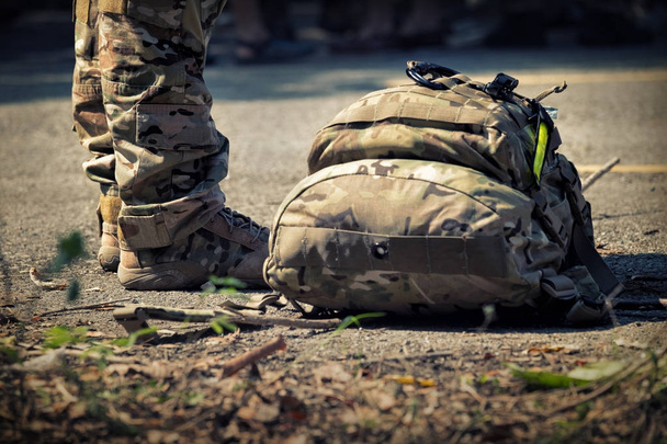 Soldiers stand with bag. Army, Military Boots lines of commando  - Photo, Image