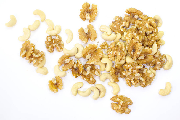 Assorted mixed nuts on a white background - Photo, Image