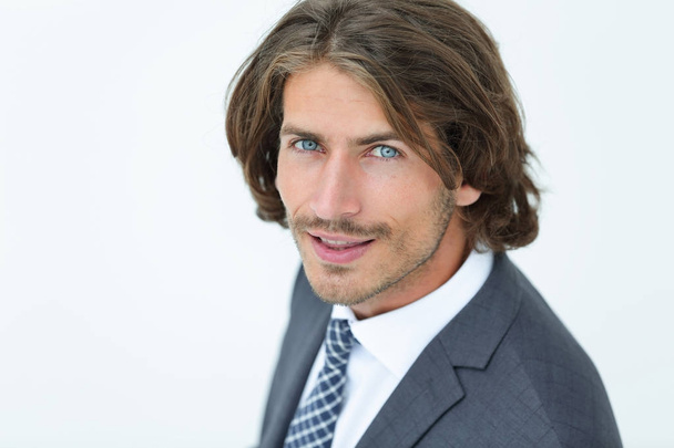 Close up portrait of an attractive young businessman smiling - Foto, afbeelding