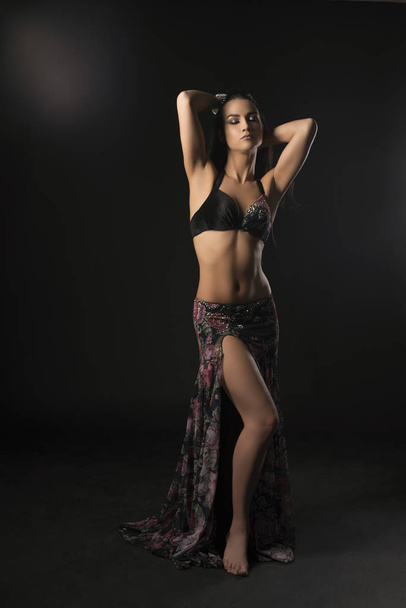 Sexy dancer in fine Easten style costume portrait - Photo, Image