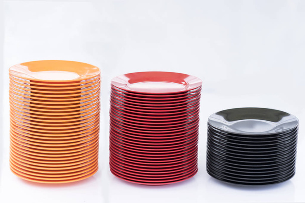 Melamine Black/Red/Orange Plate stack - Photo, Image