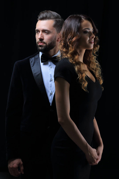 photo of young family couple on black background. - Foto, immagini
