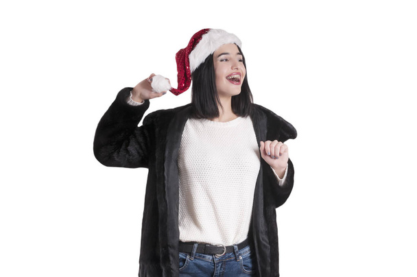 meisje in bretels santa hat geïsoleerde bontjas, verkoop - Foto, afbeelding