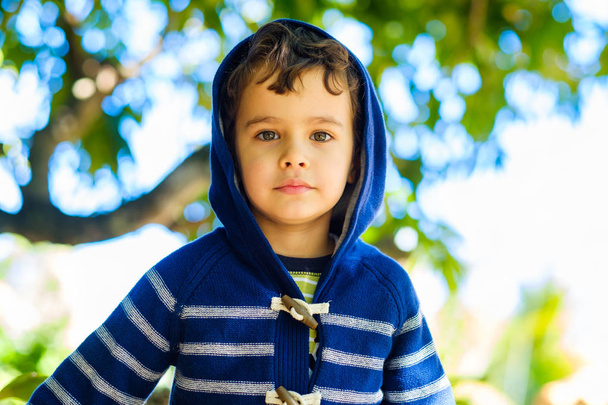 Cute boy outdoors - Foto, Imagen