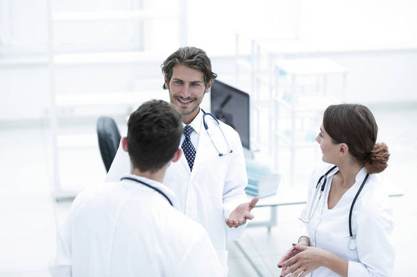 Group of doctors talking - Фото, изображение