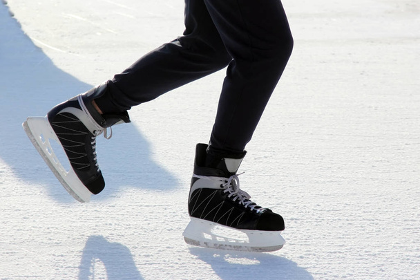 foot ice-skating person on the ice rink - Fotó, kép