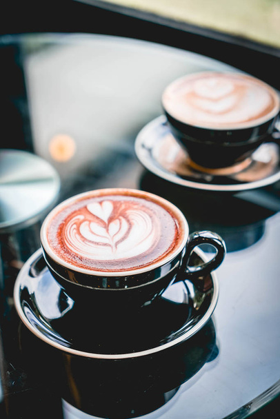 hot chocolate cup in coffee shop - Φωτογραφία, εικόνα