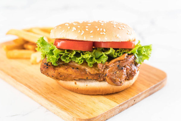 grilled chicken burger with french fries - Fotó, kép