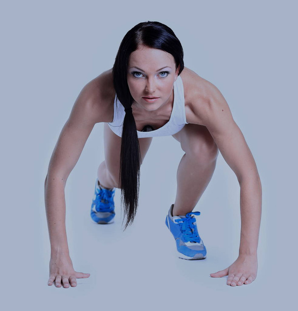 woman wearing sportswear over white background - Photo, Image