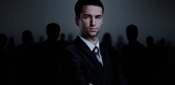 business team standing over a dark background - Photo, Image
