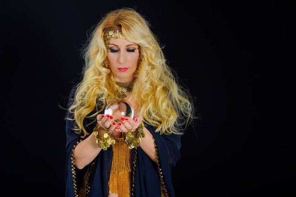 Woman fortune teller with crystal ball portrait - Photo, Image