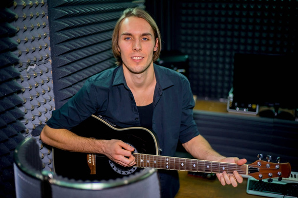 Musician in a recording studio - Foto, imagen