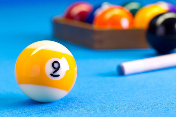 Billiard pool game nine ball with cue on billiard table - Φωτογραφία, εικόνα