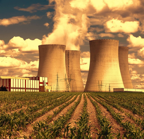 Nuclear power plant Temelin at sunset in Czech Republic Europe, corn field - Photo, Image