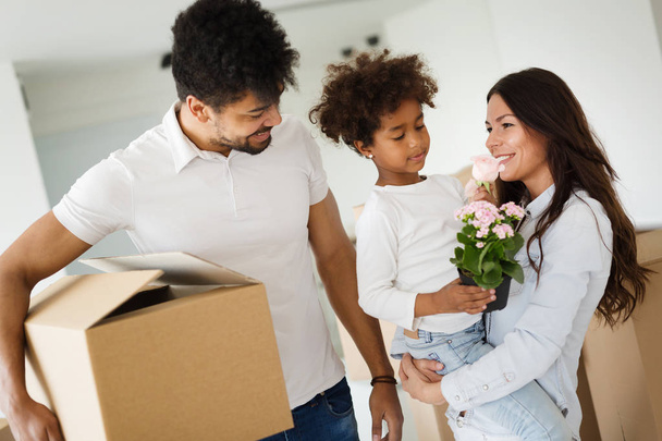 Family moving into their new home - Photo, image