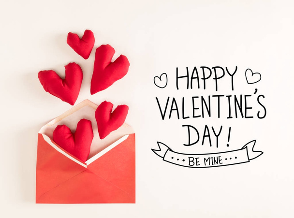 Valentines Day message with red heart cushions - Φωτογραφία, εικόνα