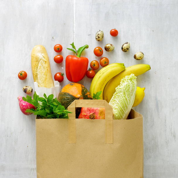 Top view paper bag of different fresh health food - 写真・画像